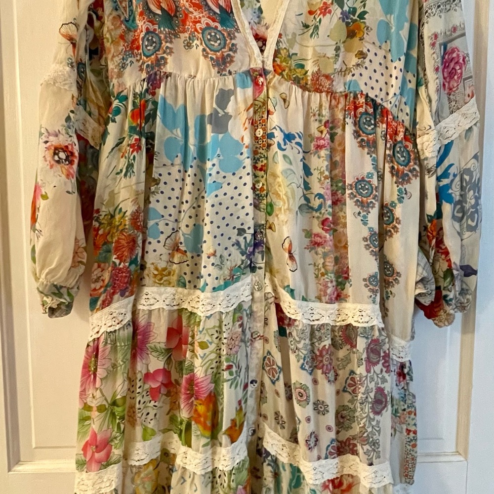 Johnny Was Milan’s silk maxi dress with lace floral details.